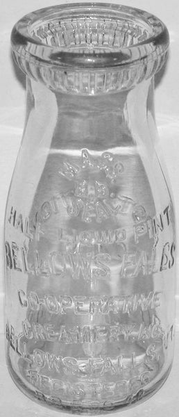 Vintage milk bottle BELLOWS FALLS COOP CREAMERY Vermont round embossed half pint
