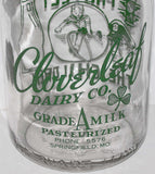 Vintage milk bottle CLOVERLEAF DAIRY CO cop child TRPQ pyro quart Springfield MO