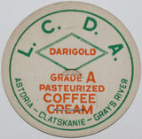 Vintage milk bottle cap L C D A Coffee Cream Astoria Clatskanie Grays River OR
