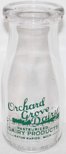 Vintage milk bottle ORCHARD GROVE DAIRY pyro half pint Eaton Rapids Michigan