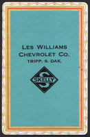 Vintage playing card SKELLY gas oil Les Williams Chevrolet Co Tripp South Dakota