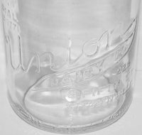 Vintage milk bottle UNION DAIRY CO round embossed quart TREQ Steubenville Ohio