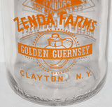 Vintage milk bottle ZENDA FARMS Golden Guernsey pyro pint Clayton New York n-mint