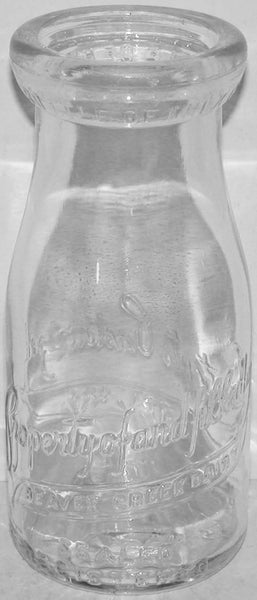 Vintage milk bottle BEAVER CREEK DAIRY Sparta Wisconsin 1941 embossed half pint