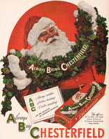 Vintage magazine ad CHESTERFIELD CIGARETTES 1946 Santa holding Christmas garland