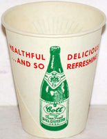 Vintage paper cup ITS COTT TO BE GOOD picturing the bottle 4oz unused n-mint+