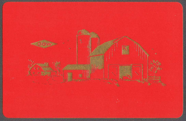 Vintage playing card DOW red and gold picturing a farm scene with barn and silos