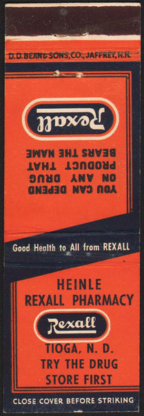 Vintage matchbook cover HEINLE REXALL PHARMACY with logo pictured Tioga North Dakota