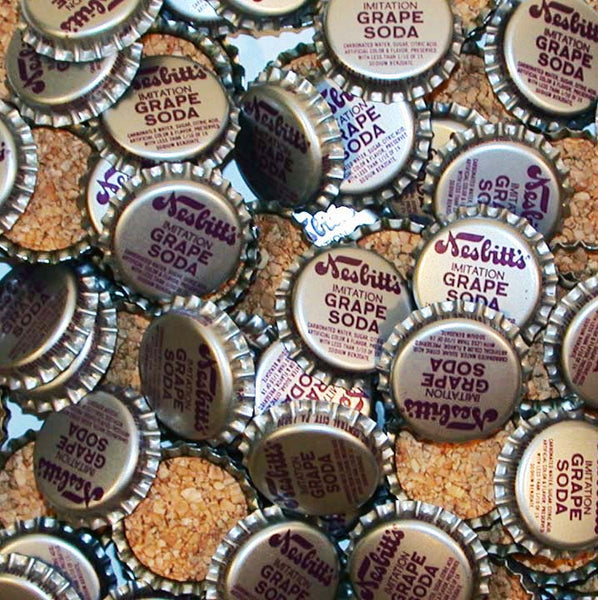 Soda pop bottle caps Lot of 12 NESBITTS GRAPE cork lined unused new old stock