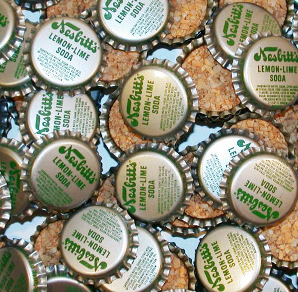 Soda pop bottle caps Lot of 12 NESBITTS LEMON LIME SODA cork lined new old stock
