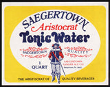 Vintage soda pop bottle label SAEGERTOWN TONIC WATER Aristocrat man pictured PA