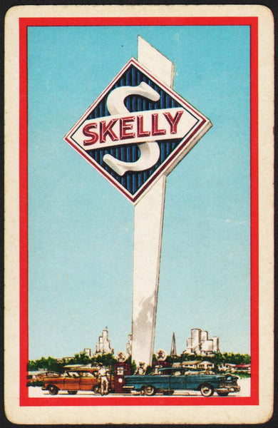 Vintage playing card SKELLY gas oil automobiles and a large Skelly sign pictured