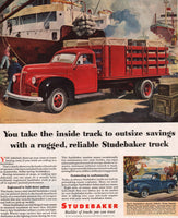 Vintage magazine ad STUDEBAKER red and blue trucks 1947 Frederic Tellander art