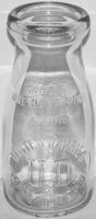 Vintage milk bottle UNITED DAIRIES U D Cedar Rapids Iowa 1931 embossed half pint