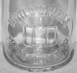 Vintage milk bottle UNITED DAIRIES U D Cedar Rapids Iowa 1931 embossed half pint
